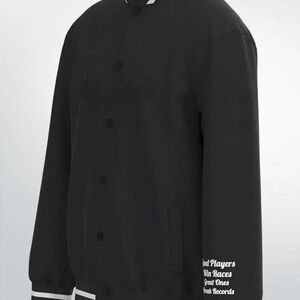 Black/ White Varsity Jacket with Graphic Sleeves with embroidered logo.